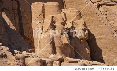Aswan, Egypt : Great Abu Simbel temple of Pharaoh Ramses II in southern Egypt in Nubia next to Lake Nasser. 87354033