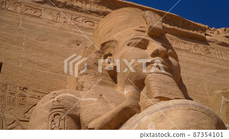 Aswan, Egypt : Great Abu Simbel temple of Pharaoh Ramses II in southern Egypt in Nubia next to Lake Nasser. 87354101