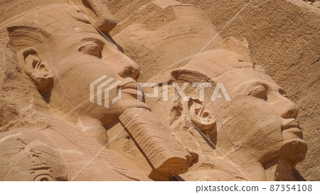 Aswan, Egypt : Great Abu Simbel temple of Pharaoh Ramses II in southern Egypt in Nubia next to Lake Nasser. 87354108