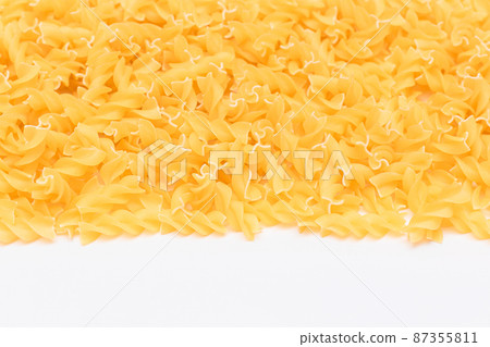 Uncooked Fusilli Pasta with Copy Space 87355811