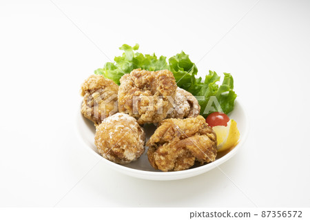 Assorted fried chicken on a plate (overhead view) 87356572