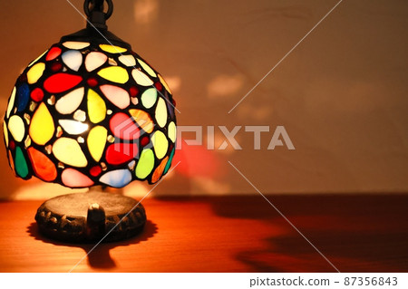 Bright and colorful stained glass-like stand light Bright and colorful stained glass-like stand light 87356843