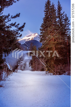 Bansko, Bulgaria forest, ski road run at dawn Bansko, Bulgaria forest, ski road run at dawn 87357206