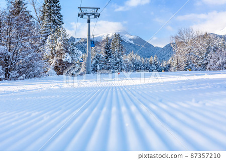 Groomed ski run and mountains, Bansko, Bulgaria 87357210