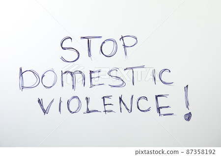 Phrase STOP DOMESTIC VIOLENCE on white background, top view Phrase STOP DOMESTIC VIOLENCE on white background, top view 87358192