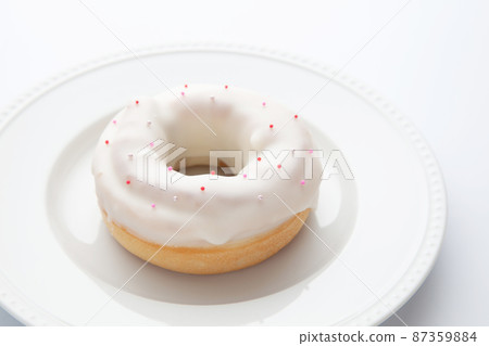 Sugar glazed donuts white background 87359884