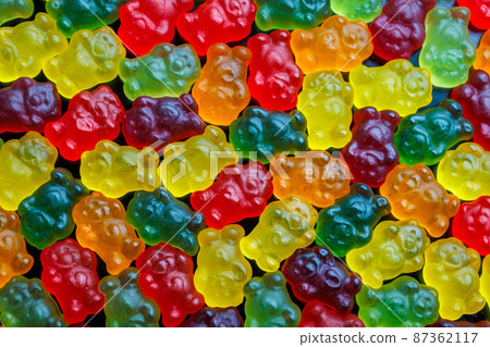 full-frame background and texture pattern of colorful jelly bears laid closely on flat surface full-frame background and texture pattern of colorful jelly bears laid closely on flat surface 87362117