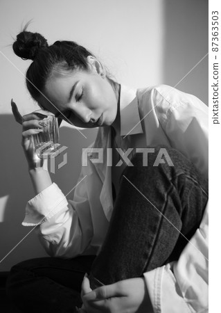young woman with alcohol young woman with alcohol 87363503