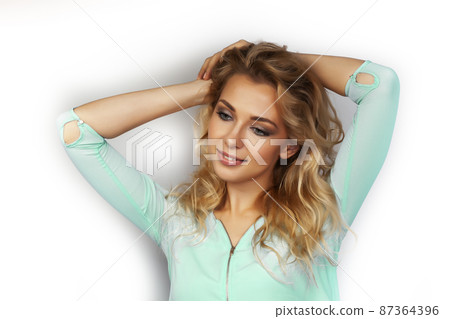 young pretty stylish blond girl posing emotional isolated on white background happy smiling cool smile, lifestyle people concept 87364396
