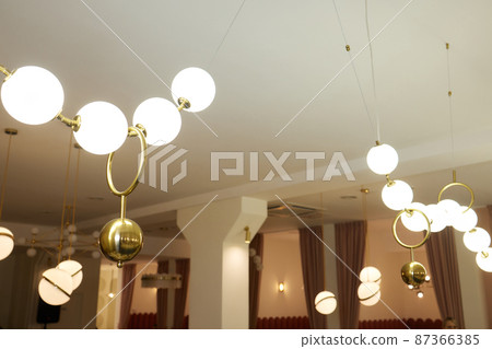 Design loft lamp with dim light and straight long line of beam. Design loft lamp with dim light and straight long line of beam. 87366385