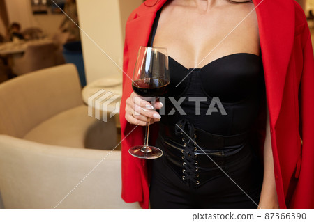 close-up of gorgeous woman with a glass of champagne. party and holiday celebration. close-up of gorgeous woman with a glass of champagne. party and holiday celebration. 87366390