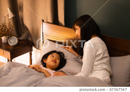 Parent and child sleeping 87367567