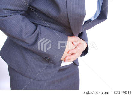 A stomach-suppressing woman A stomach-suppressing woman 87369011