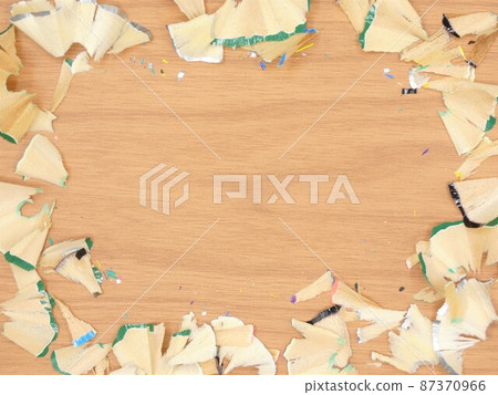 Shavings of colored pencils placed in a mess 87370966