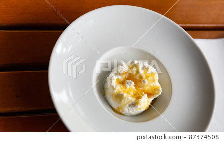 Fresh cheese with honey 87374508