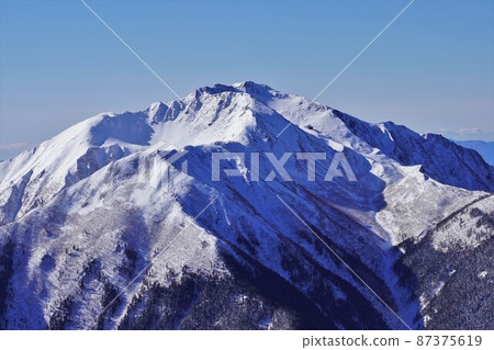 Mt. Senjogatake from the summit of Mt. Kaikoma in winter Mt. Senjogatake from the summit of Mt. Kaikoma in winter 87375619