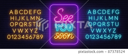 See You Soon neon lettering on brick wall background. 87378524