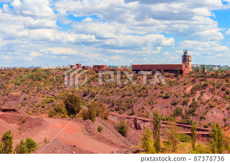 View of huge iron ore quarry in Kryvyi Rih, Ukraine. Open pit mining View of huge iron ore quarry in Kryvyi Rih, Ukraine. Open pit mining 87378736