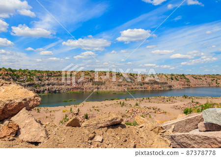 View of the lake at abandoned quarry on summer View of the lake at abandoned quarry on summer 87378778