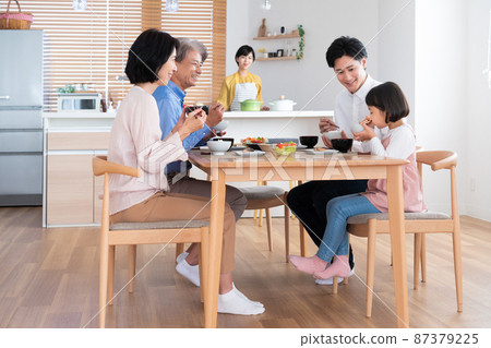 Meal with a family of three generations Meal with a family of three generations 87379225