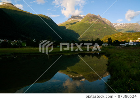 Sunset over Innvikfjorden and Loen village, Stryn, Norway 87380524