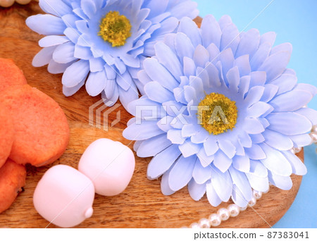 White day image of sweets and flowers 87383041
