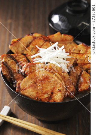 Charcoal-grilled pork bowl, a specialty of Obihiro, Tokachi, Hokkaido 87383601