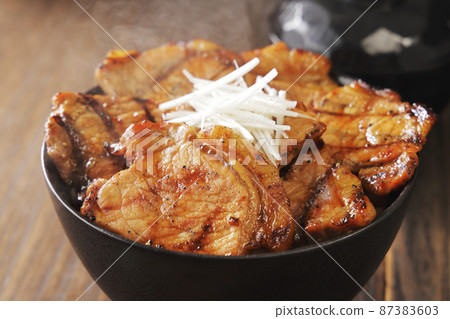 Charcoal-grilled pork bowl, a specialty of Obihiro, Tokachi, Hokkaido Charcoal-grilled pork bowl, a specialty of Obihiro, Tokachi, Hokkaido 87383603