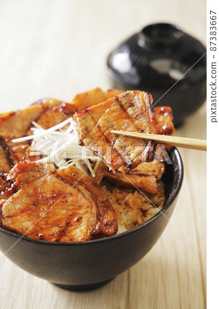 Charcoal-grilled pork bowl, a specialty of Obihiro, Tokachi, Hokkaido Charcoal-grilled pork bowl, a specialty of Obihiro, Tokachi, Hokkaido 87383667