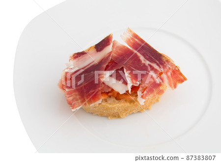 Spanish tapa, ham and tomato 87383807