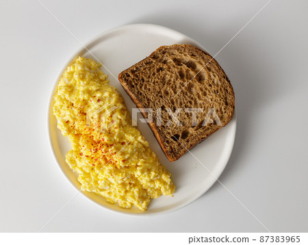 Food on plate for breakfast,dinner or supper 87383965
