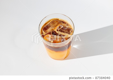 Top view of cold summer beverage on white background Top view of cold summer beverage on white background 87384040