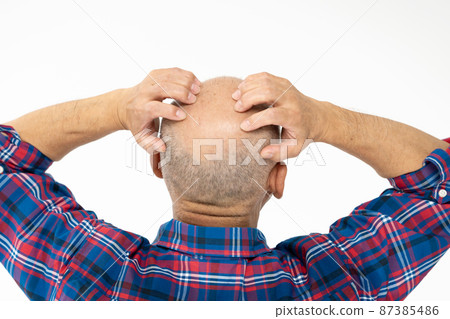 Worried senior man back view skinhead 87385486