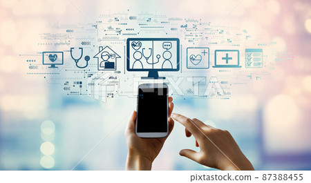 Telehealth theme with person using smartphone Telehealth theme with person using smartphone 87388455