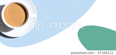 A cup of coffee overhead view on desk A cup of coffee overhead view on desk 87388512
