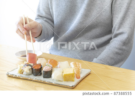 Variations of men eating sushi Variations of men eating sushi 87388555