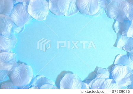 Light blue petals and light blue background Light blue petals and light blue background 87389026
