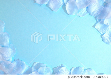 Light blue petals and light blue background Light blue petals and light blue background 87389027