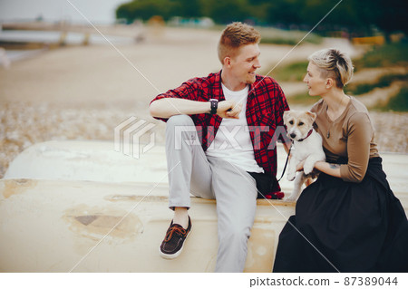 happy couple on a beach happy couple on a beach 87389044