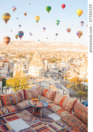 Traditional turkish breakfast with fruits with Cappadocia view 87389329