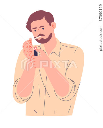 Young man lights a cigarette with a lighter 87390129