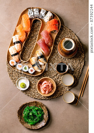 Japanese dish sushi and rolls rice with fish Japanese dish sushi and rolls rice with fish 87392144