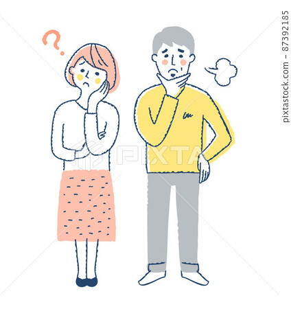 Middle-aged couple with troubled facial expressions whole body 87392185