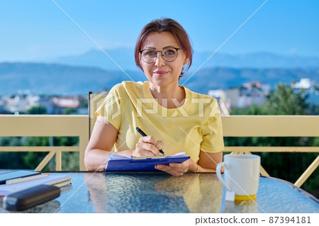 Female psychologist, psychiatrist looking at webcam, talking, counseling online Female psychologist, psychiatrist looking at webcam, talking, counseling online 87394181