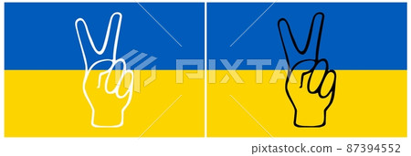 A gesture of victory and solidarity against the national colors of the flag of Ukraine. A gesture of victory and solidarity against the national colors of the flag of Ukraine. 87394552
