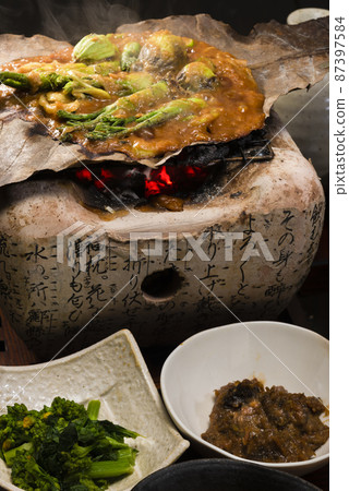 Hoba Takayama local cuisine of spring wild plants grilled with Hoba miso 87397584