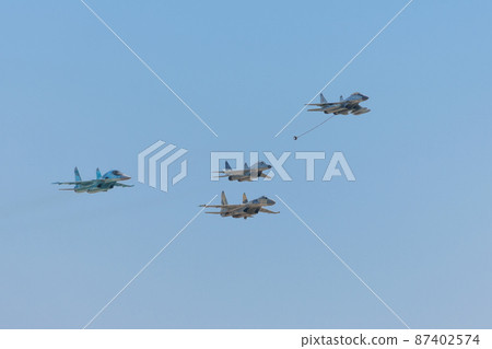 Mig and Sukhoi jet fighter formation flight Mig and Sukhoi jet fighter formation flight 87402574