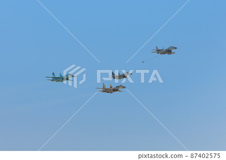 Mig and Sukhoi jet fighter formation flight 87402575