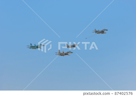 Mig and Sukhoi jet fighter formation flight 87402576