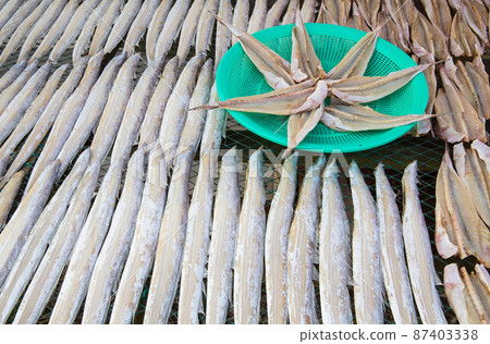 Dried fish at the permanent market in the fishing village 87403338
